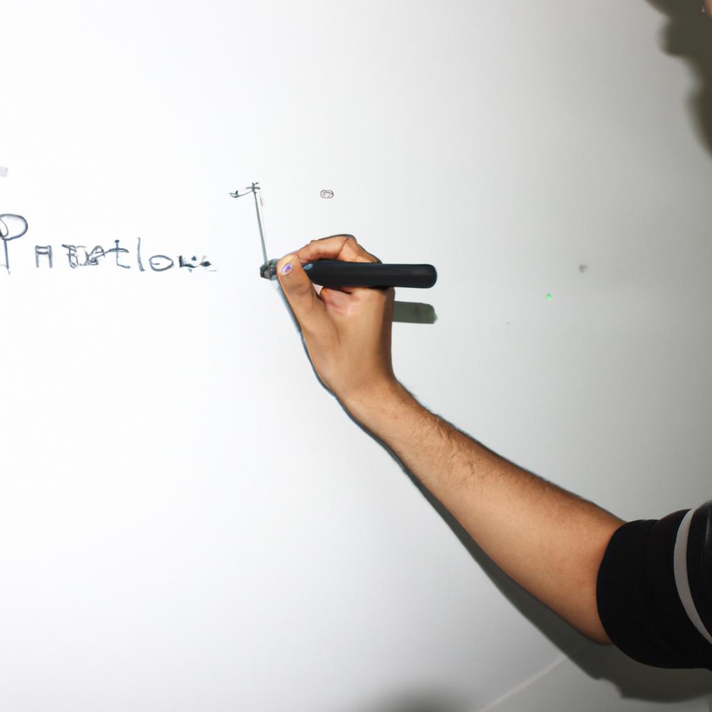 Person writing on a whiteboard